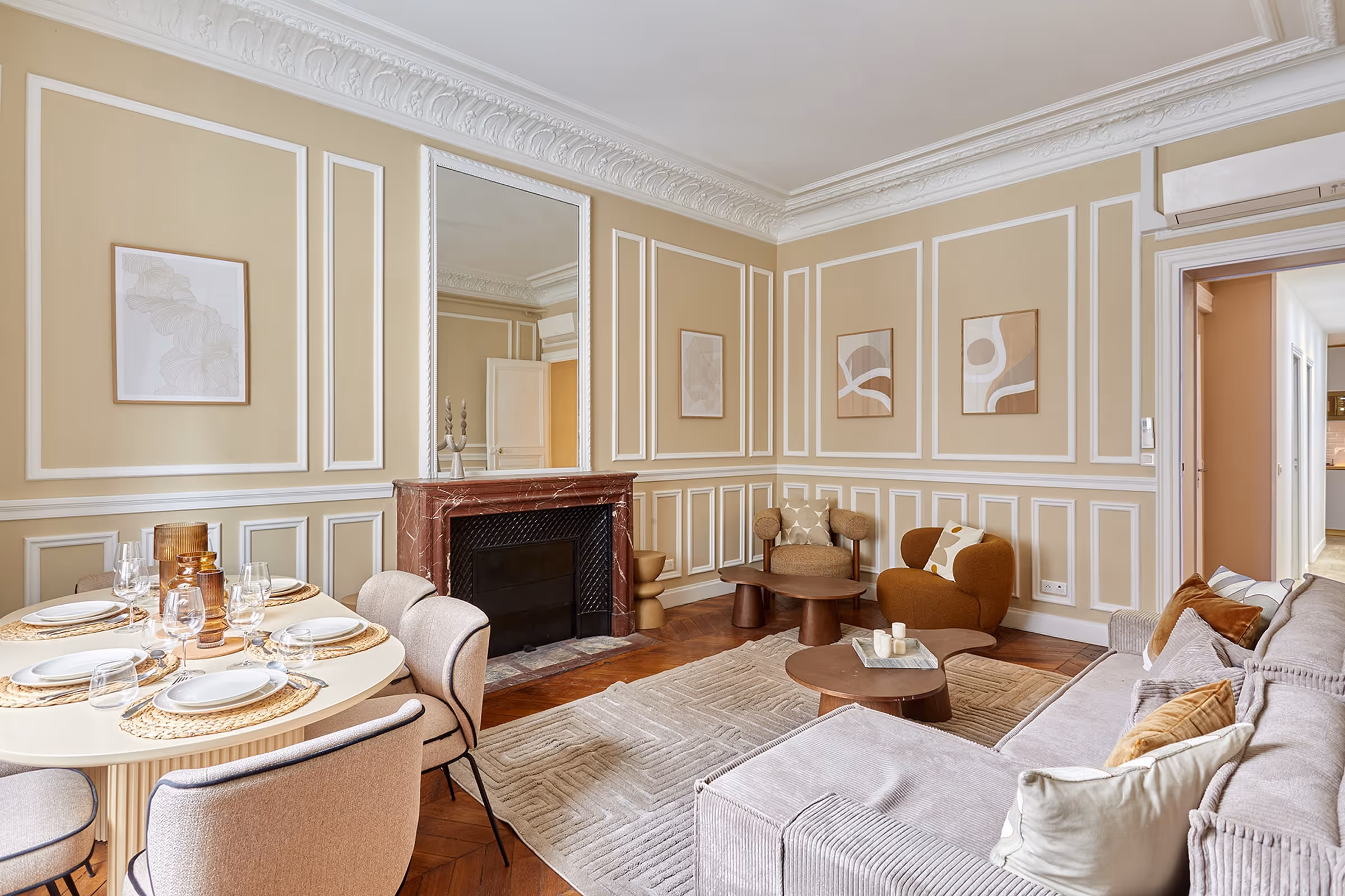 Sculptural chairs in a warm, light-filled interior